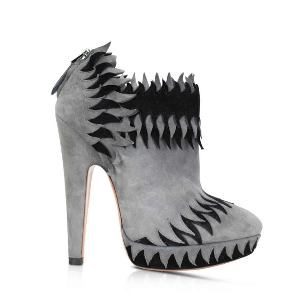 ALAÏA FRINGE ANKLE BOOTS